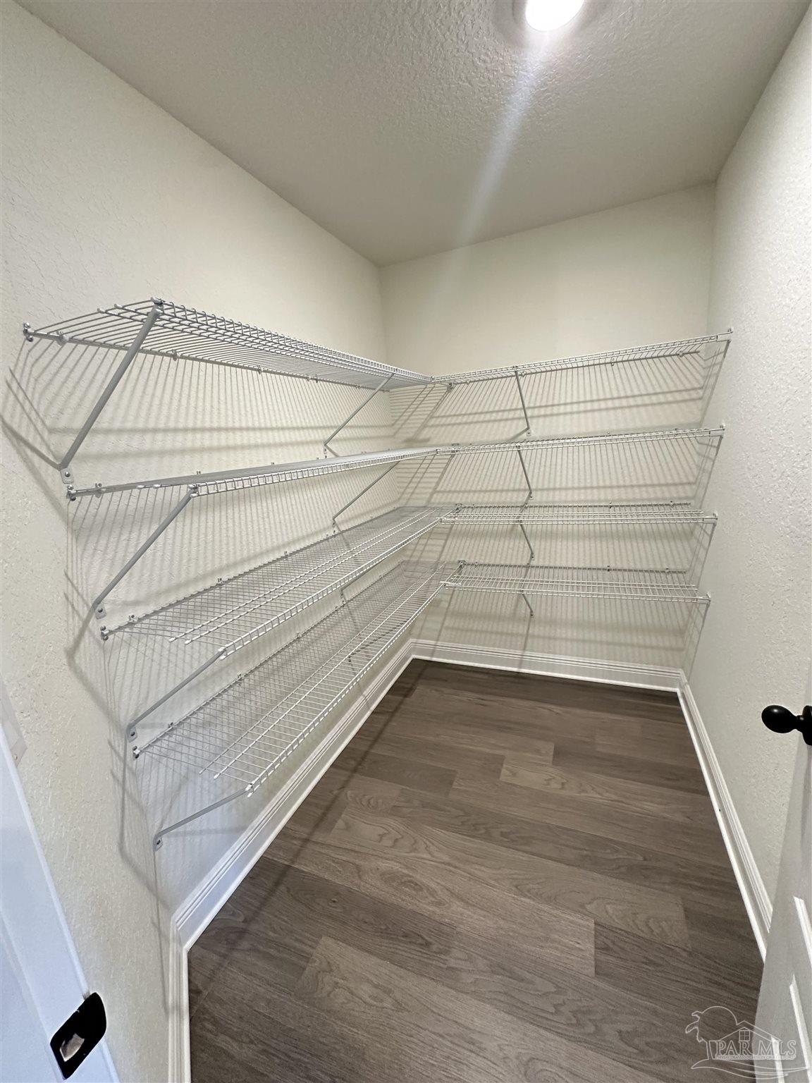 5214 Barnett Road Milton, FL 32583 - Photo 10 of 22 a view of a room with empty racks