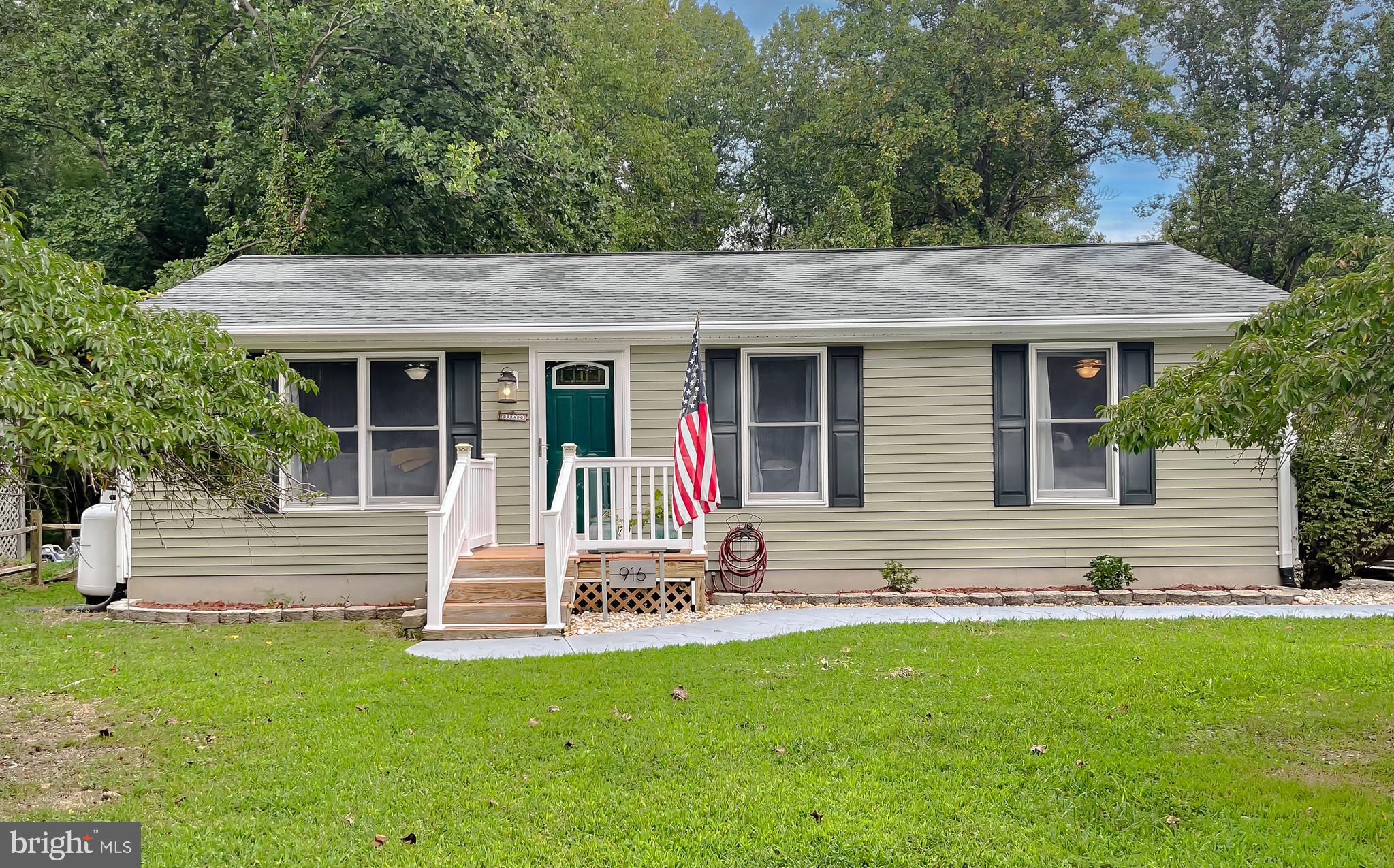 916 Crystal Rock Road Lusby, MD 20657 - Photo 1 of 44 a view of house with a yard