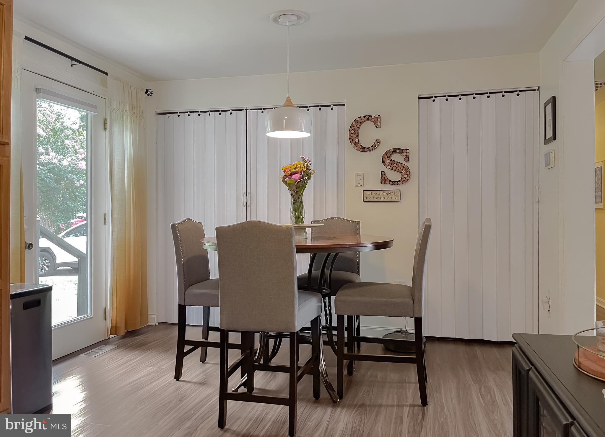 916 Crystal Rock Road Lusby, MD 20657 - Photo 10 of 44 a dining room with furniture and window