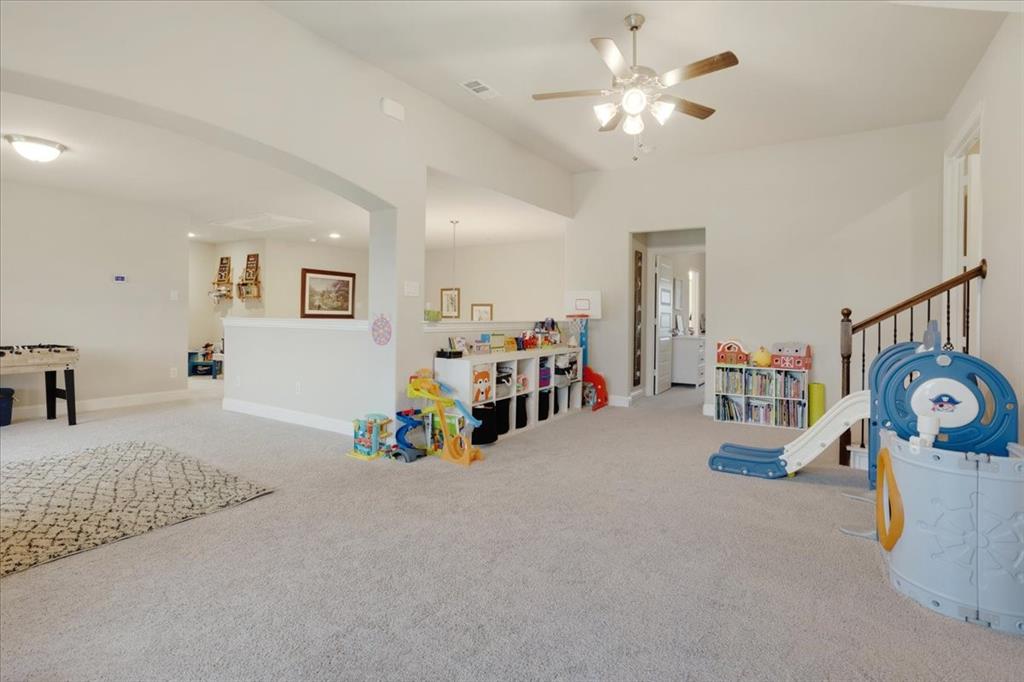 1205 Redbud Street Howe, TX 75459 - Photo 25 of 40 a view of a room with gym equipment