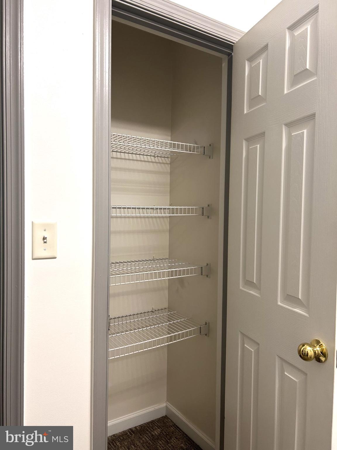 426 Ridgefield Avenue Stephens City, VA 22655 - Photo 20 of 22 a view of a room with rack on the wall