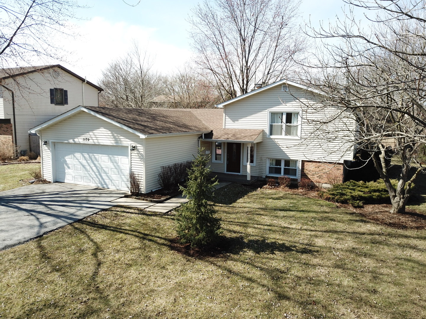 1172 North Old Bridge Road Palatine, IL 60067 - Photo 1 of 27 a view of a yard in front of a house