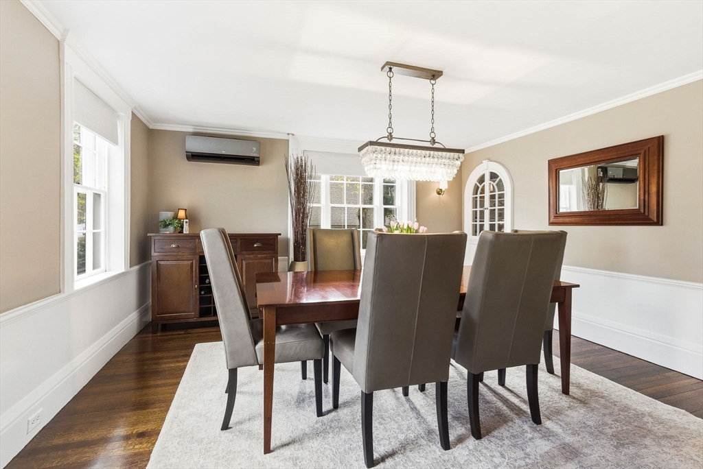 5 Great Road Bedford, MA 01730 - Photo 12 of 42 a view of a dining room with furniture window and wooden floor