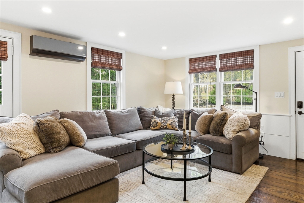 5 Great Road Bedford, MA 01730 - Photo 14 of 42 a living room with furniture and a large window