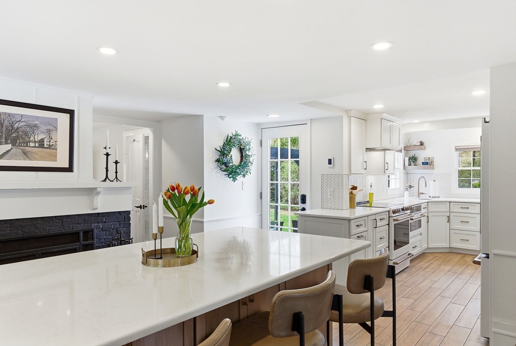 5 Great Road Bedford, MA 01730 - Photo 2 of 42 a kitchen with a table and chairs