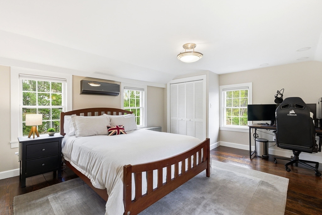 5 Great Road Bedford, MA 01730 - Photo 21 of 42 a bedroom with a bed and a window