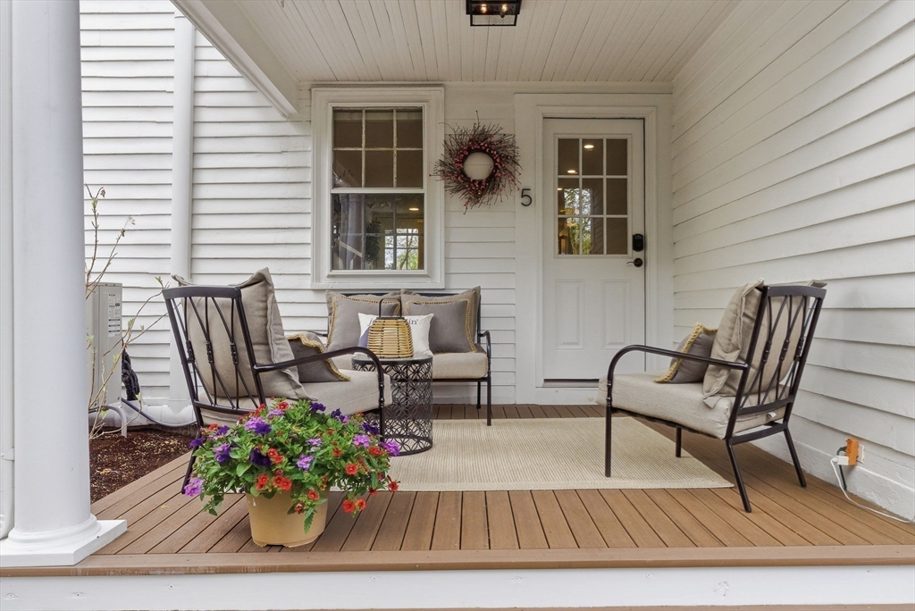 5 Great Road Bedford, MA 01730 - Photo 33 of 42 a view of a dining room with furniture and wooden floor