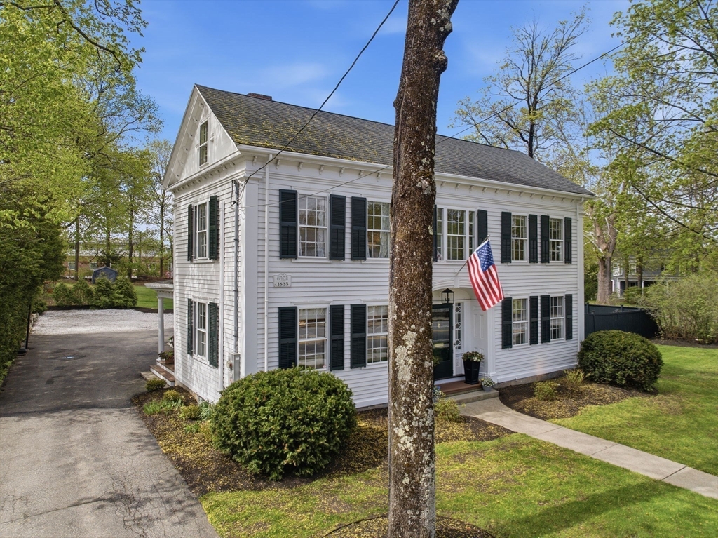 5 Great Road Bedford, MA 01730 - Photo 39 of 42 a front view of a house with garden