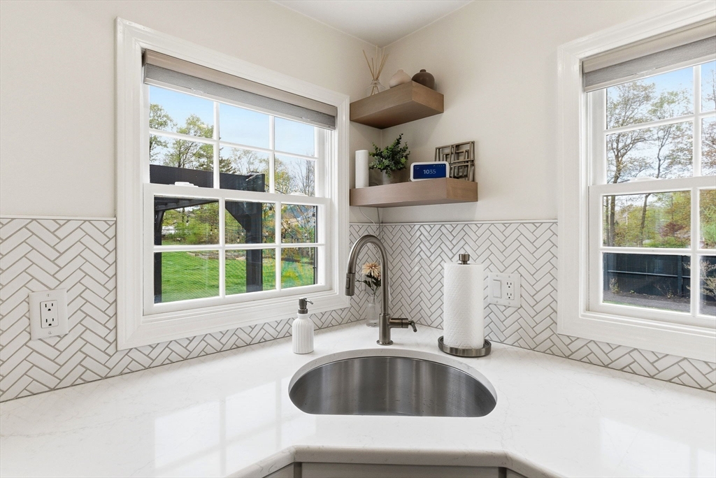 5 Great Road Bedford, MA 01730 - Photo 7 of 42 a bathroom with a sink and a bathtub