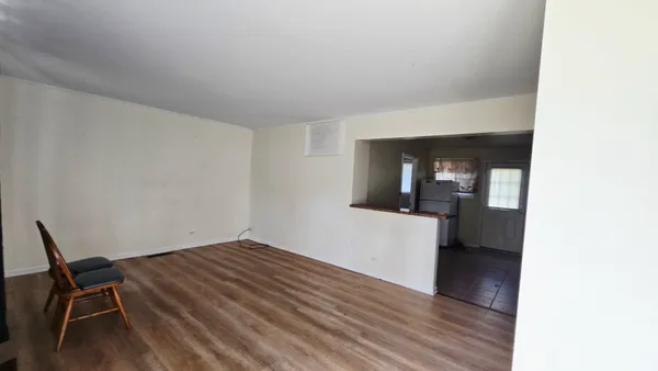 a view of livingroom with furniture and wooden floor
