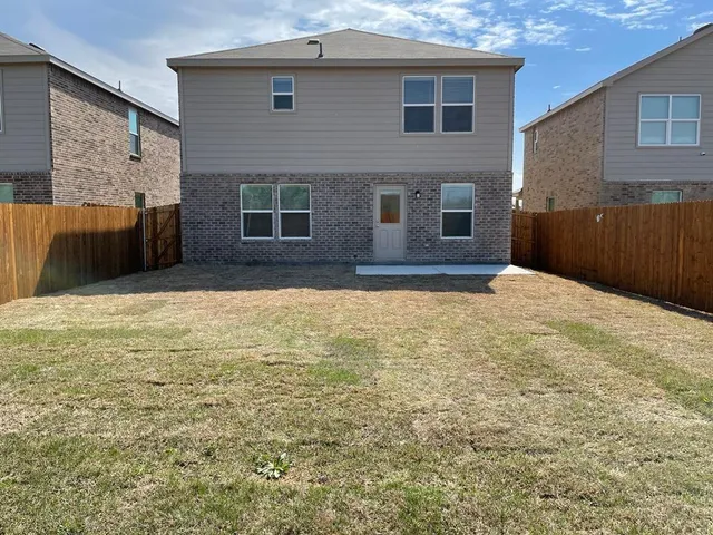 a view of an house with backyard space