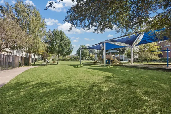 a view of a wrought iron fences in front of house