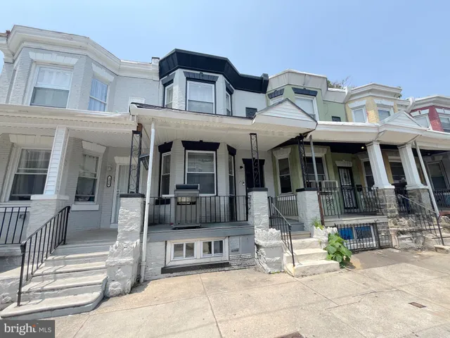 a view of a building with sitting area