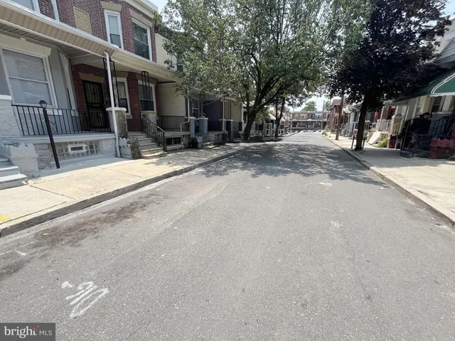 a view of road with a building