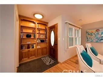 a view of kitchen with furniture and a window