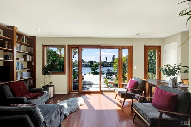 a room with furniture and a wooden floor