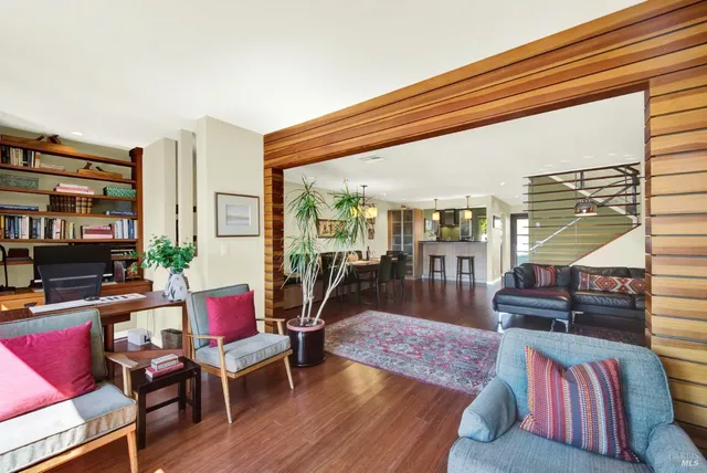 a kitchen with stainless steel appliances a sink and a large window