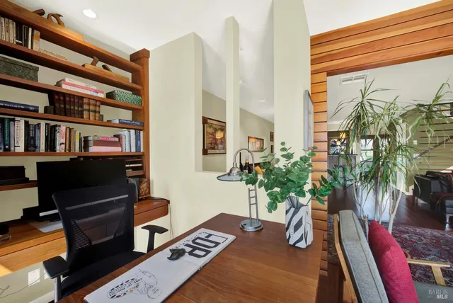 a kitchen with granite countertop a sink and a stove top oven