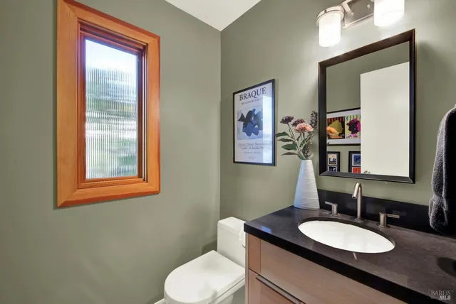 a view of a patio with table and chairs and potted plants