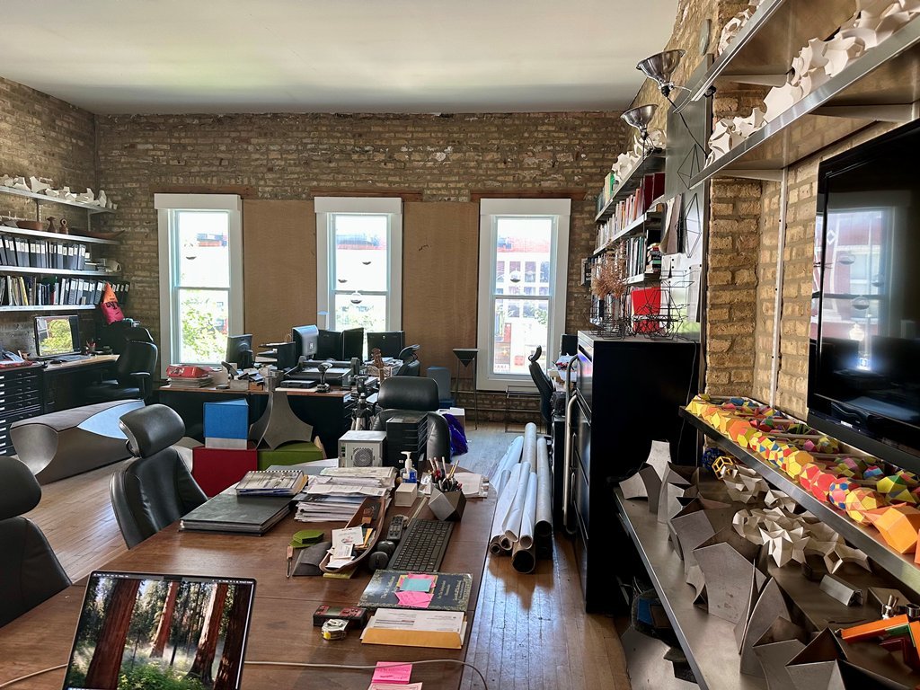 1906 North Milwaukee Avenue Chicago, IL 60647 - Photo 12 of 23 a living room with lots of furniture and a flat screen tv