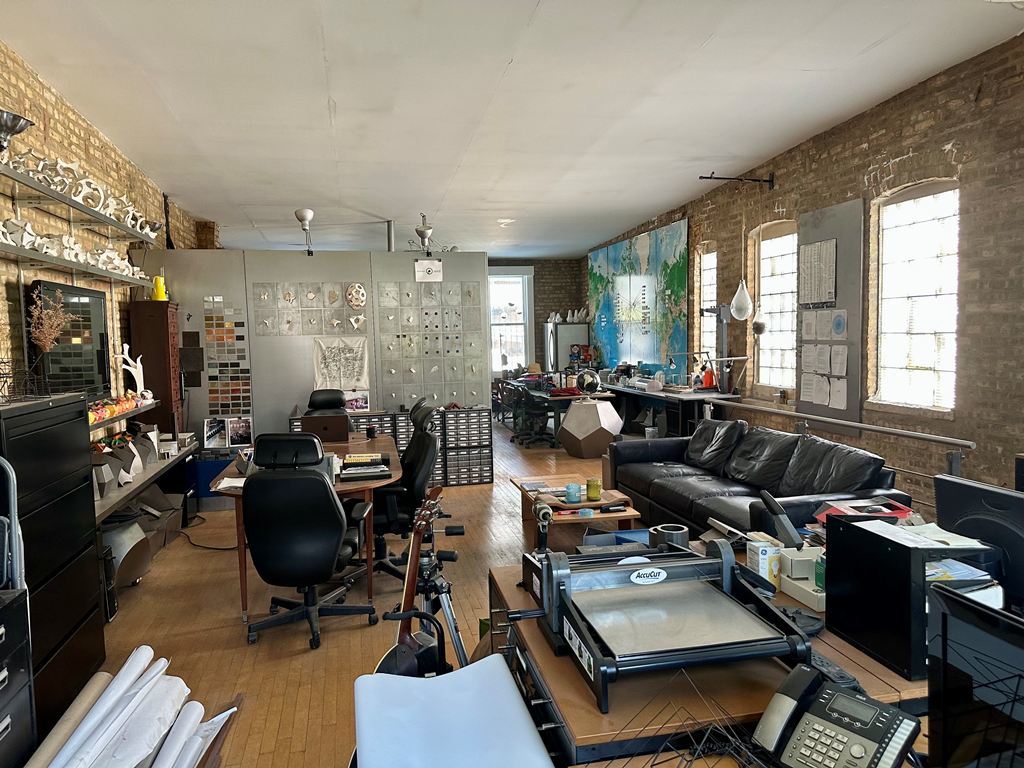 1906 North Milwaukee Avenue Chicago, IL 60647 - Photo 13 of 23 a living room with furniture and a large window