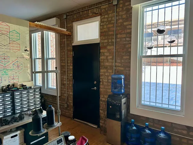 a brick building with a door