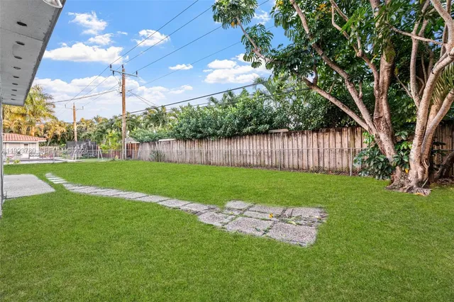 a view of a garden with a tree