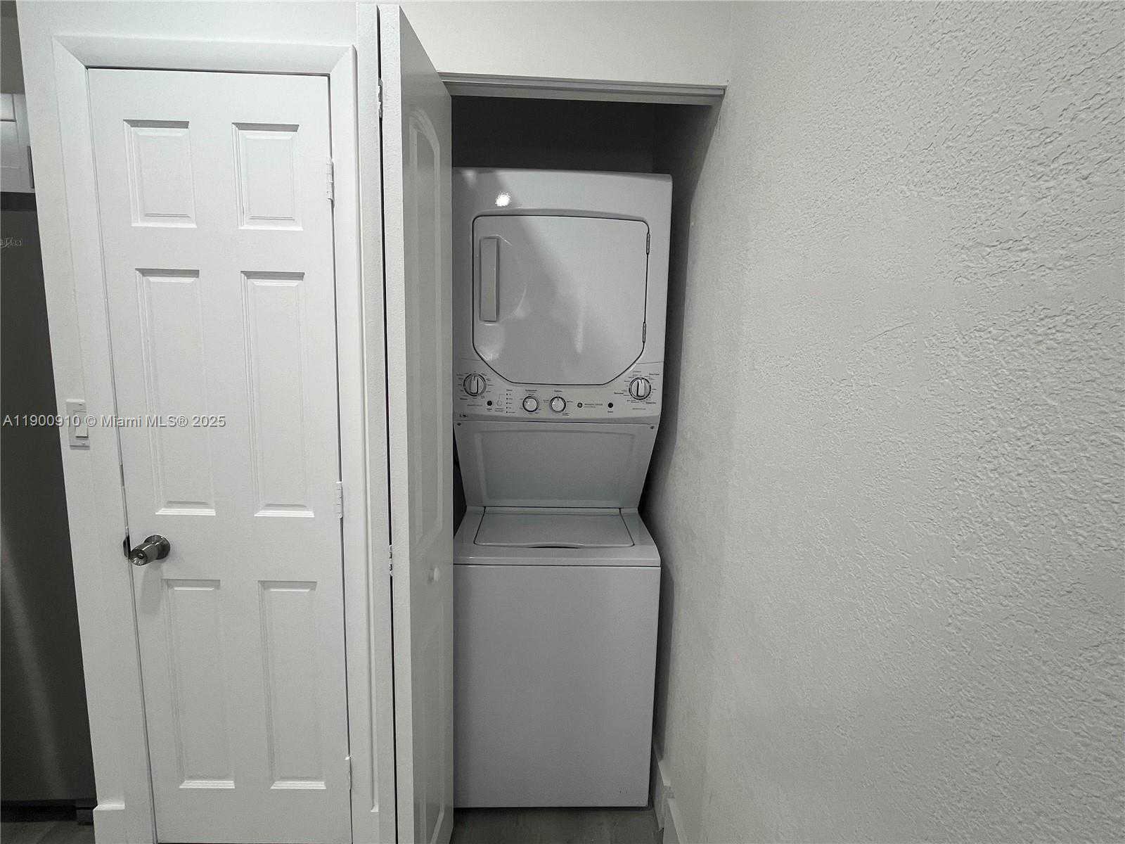 1923 Northwest 66th Street Miami, FL 33147 - Photo 12 of 27 a utility room with dryer and washer
