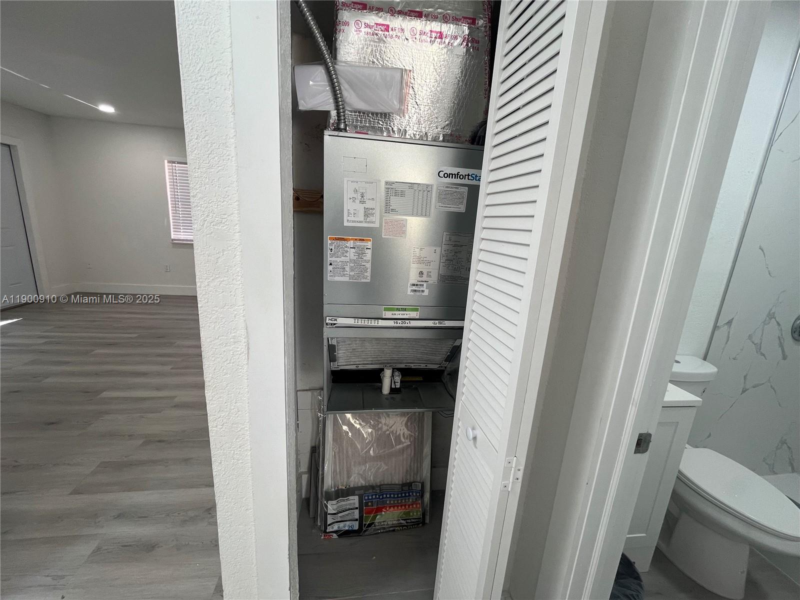 1923 Northwest 66th Street Miami, FL 33147 - Photo 27 of 27 a bathroom with a toilet