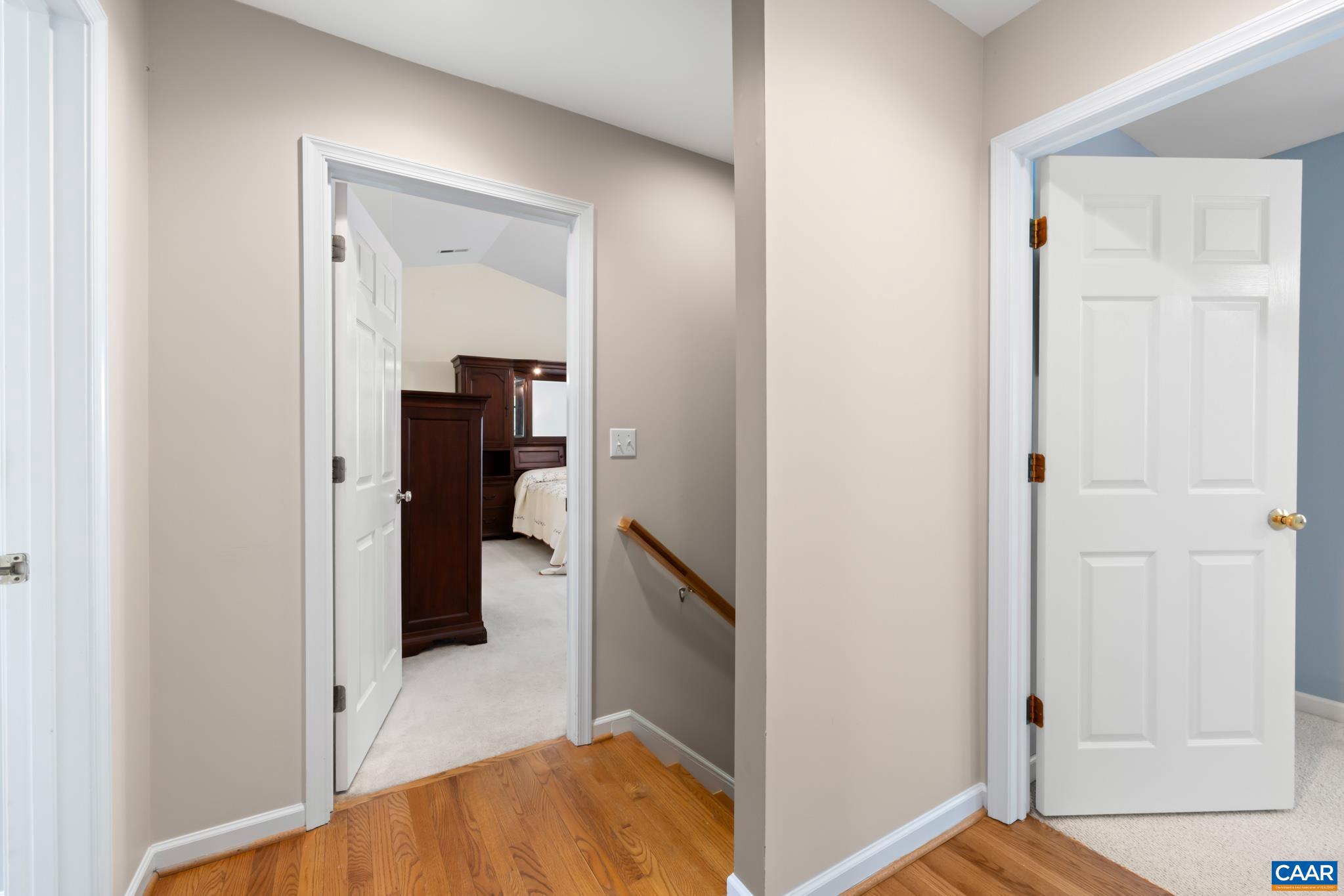 96 Red Cedar Road Barboursville, VA 22923 - Photo 24 of 59 a view of a hallway with wooden floor and staircase