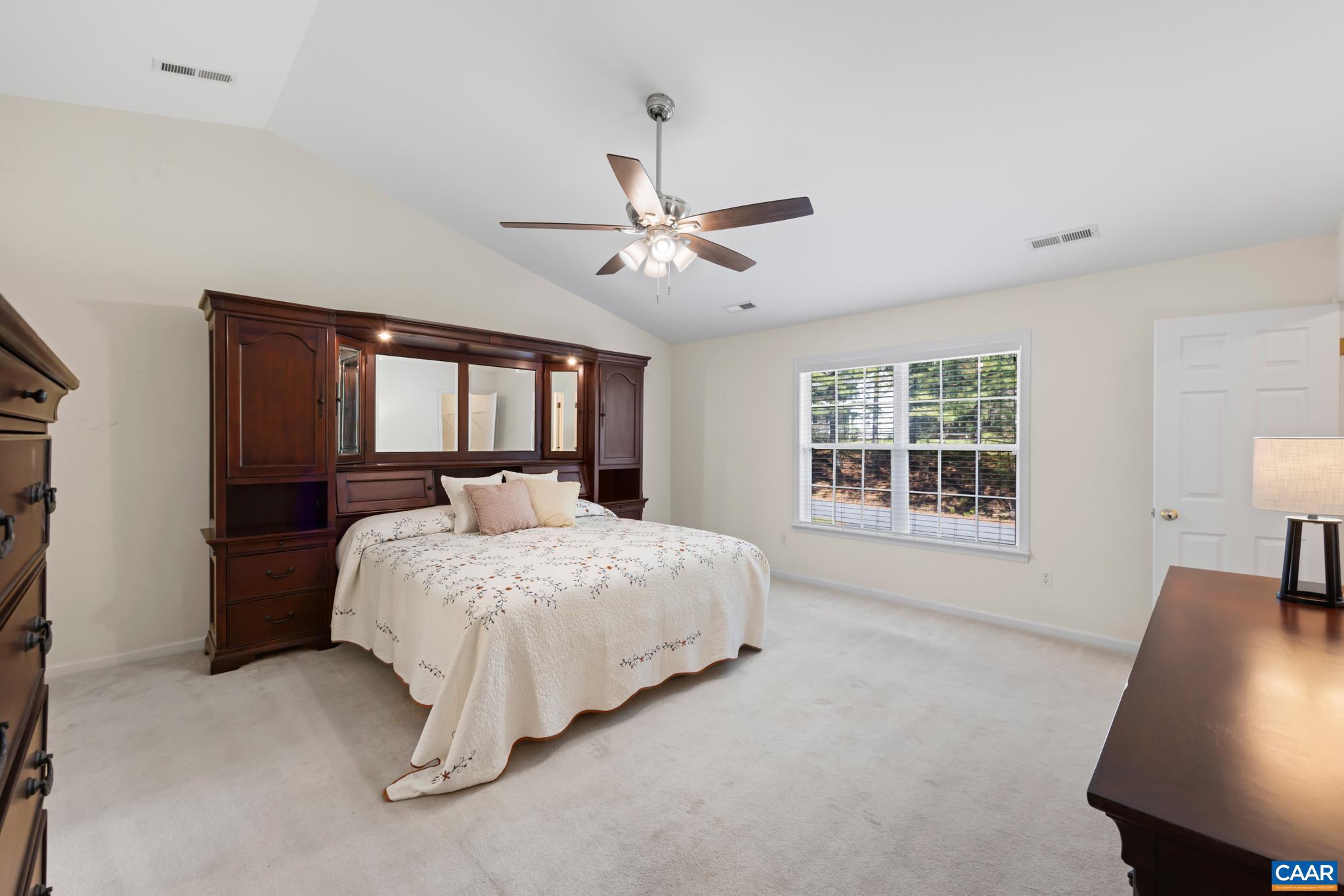 96 Red Cedar Road Barboursville, VA 22923 - Photo 25 of 59 a bed sitting in a spacious bedroom next to a window