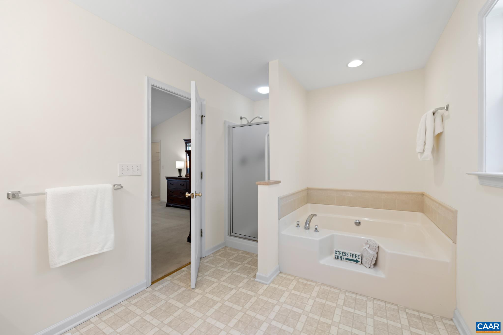 96 Red Cedar Road Barboursville, VA 22923 - Photo 30 of 59 a bathroom with a bathtub and a shower