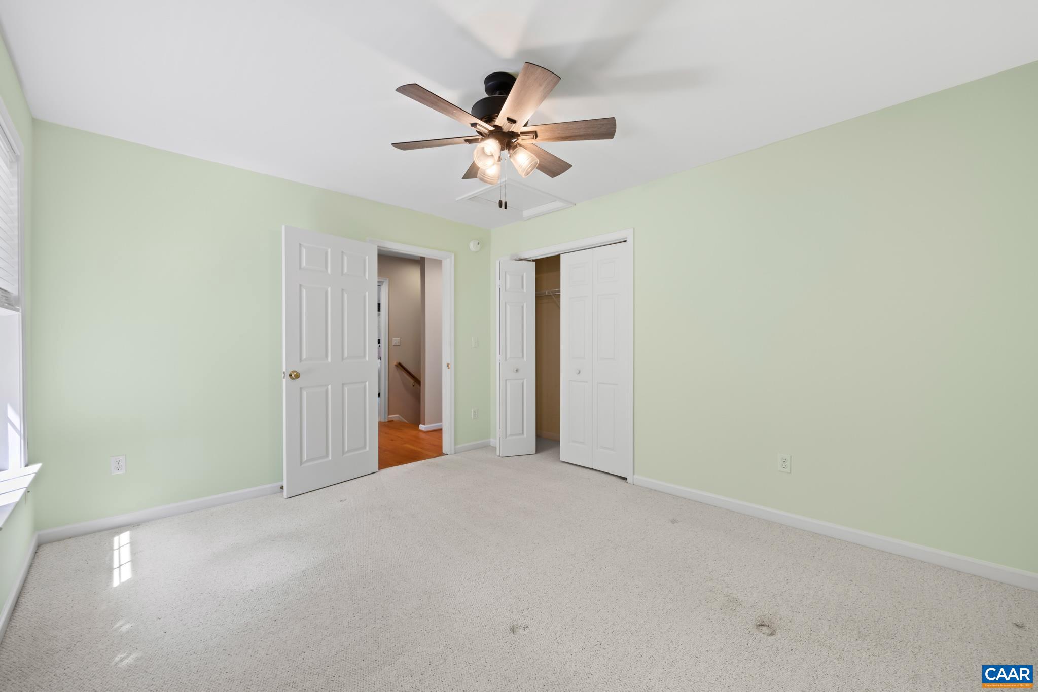 96 Red Cedar Road Barboursville, VA 22923 - Photo 33 of 59 a view of a livingroom with a ceiling fan and window