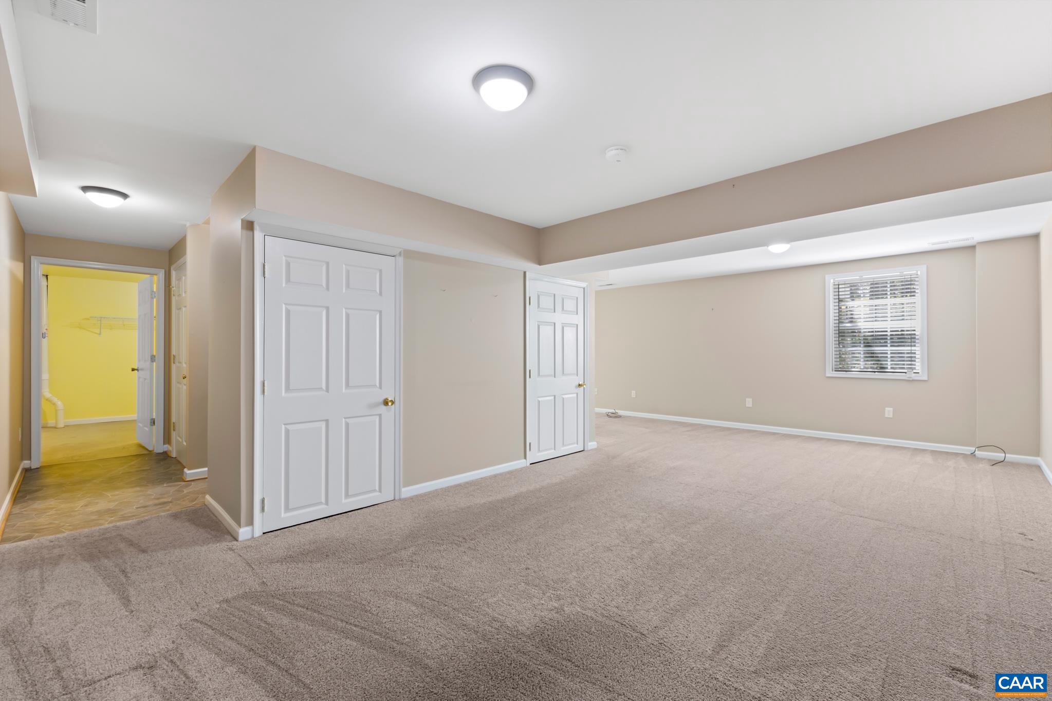 96 Red Cedar Road Barboursville, VA 22923 - Photo 38 of 59 an empty room with windows and closet