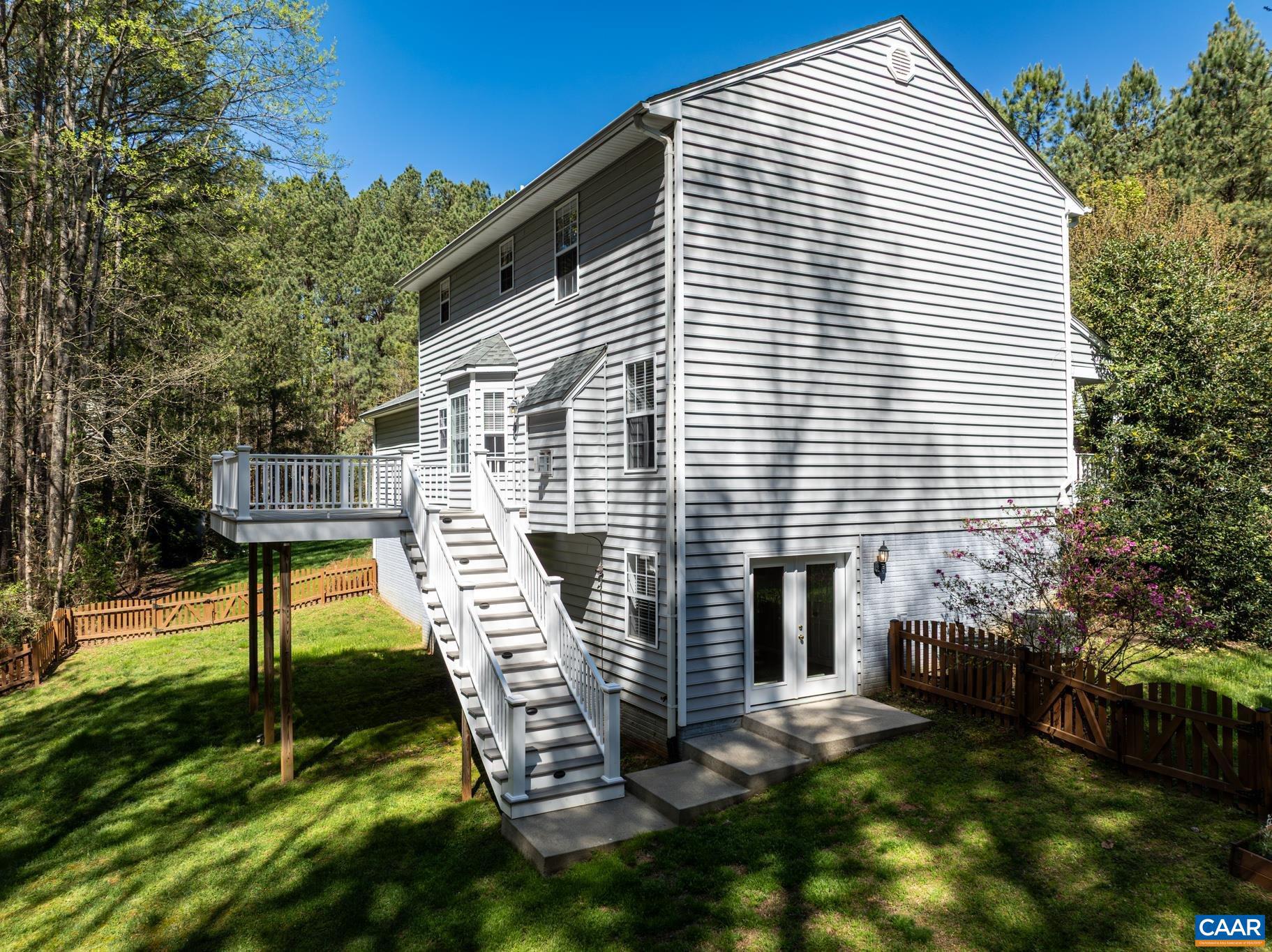 96 Red Cedar Road Barboursville, VA 22923 - Photo 45 of 59 a view of a house with backyard and a tree