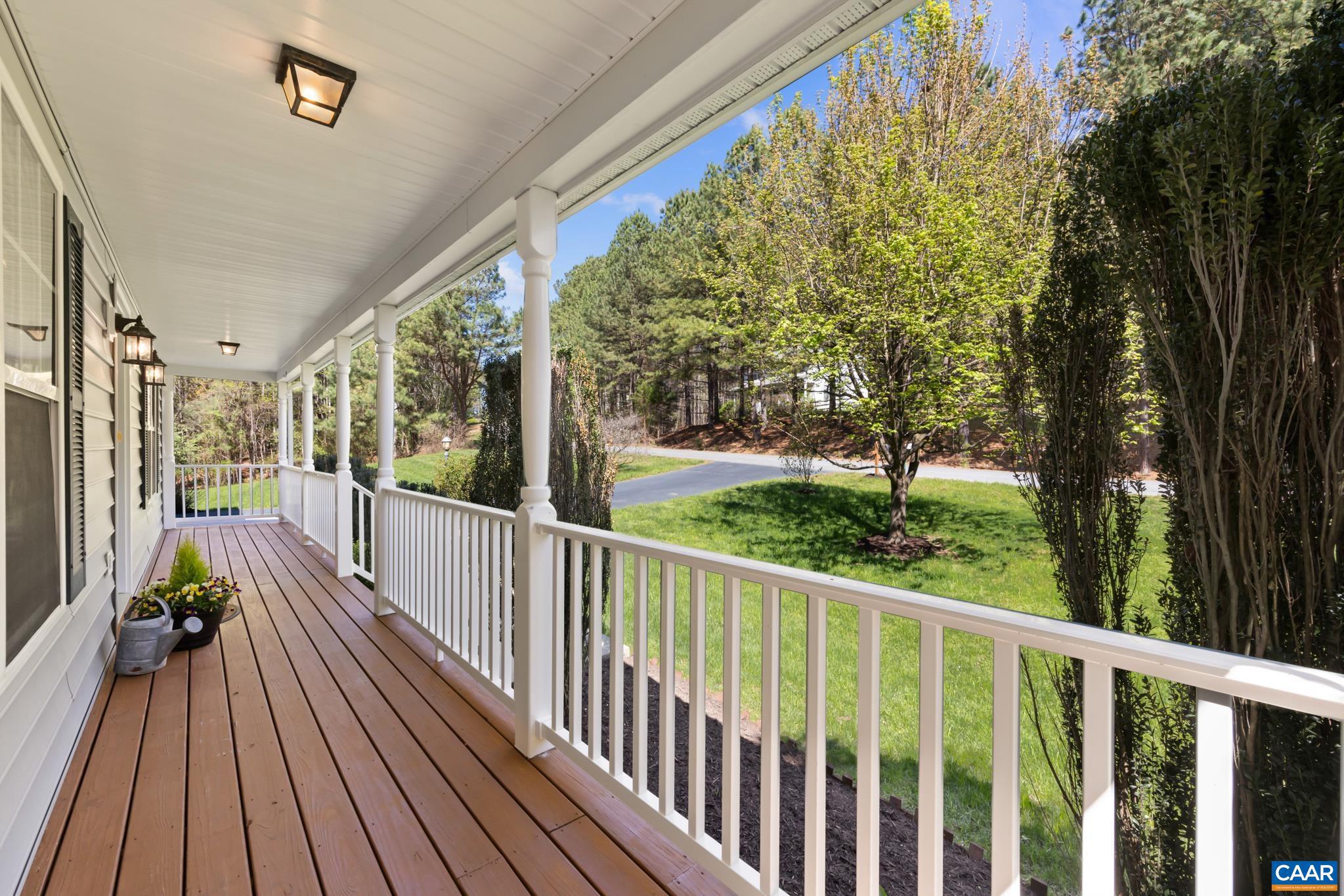 96 Red Cedar Road Barboursville, VA 22923 - Photo 5 of 59 a view of balcony with wooden floor and fence