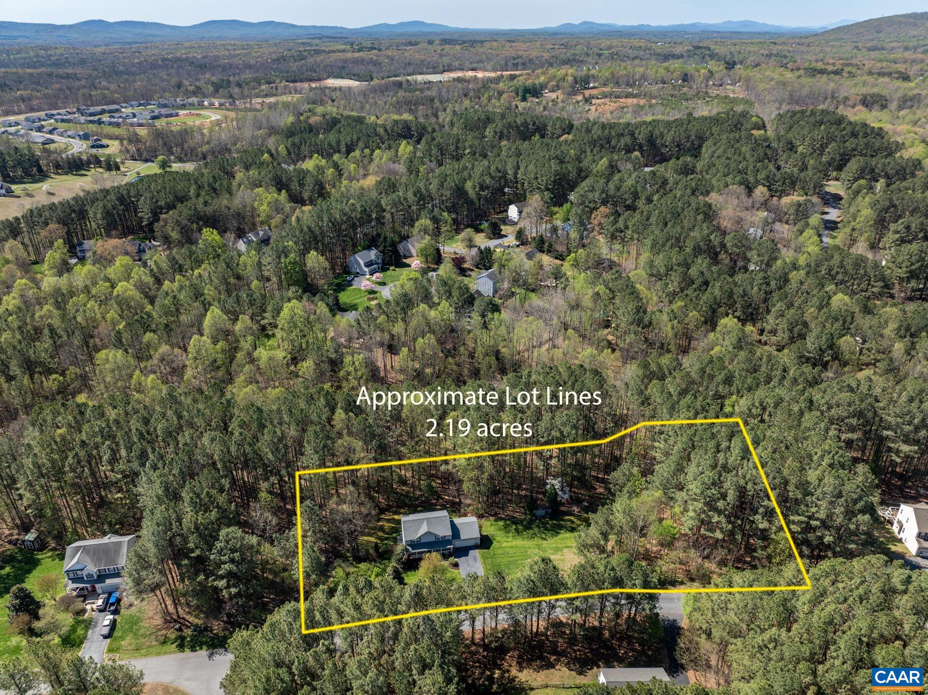 96 Red Cedar Road Barboursville, VA 22923 - Photo 56 of 59 an aerial view of a house with a yard