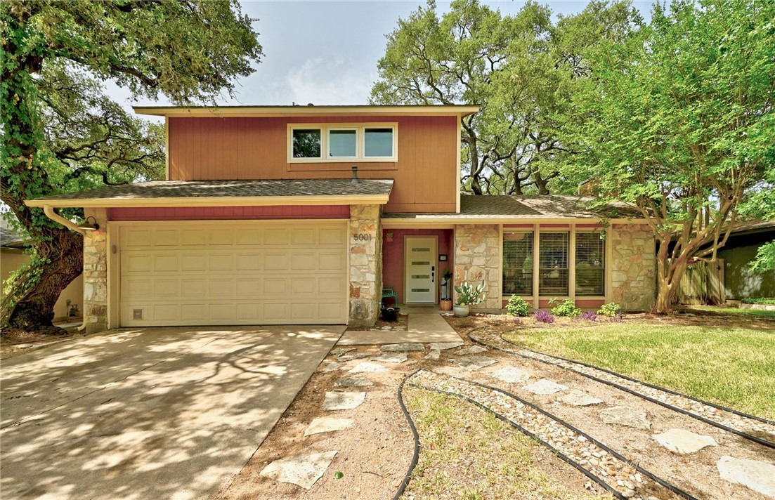 5001 Wing Road Austin, TX 78749 - Photo 1 of 1 Large trees surround this beautiful home.