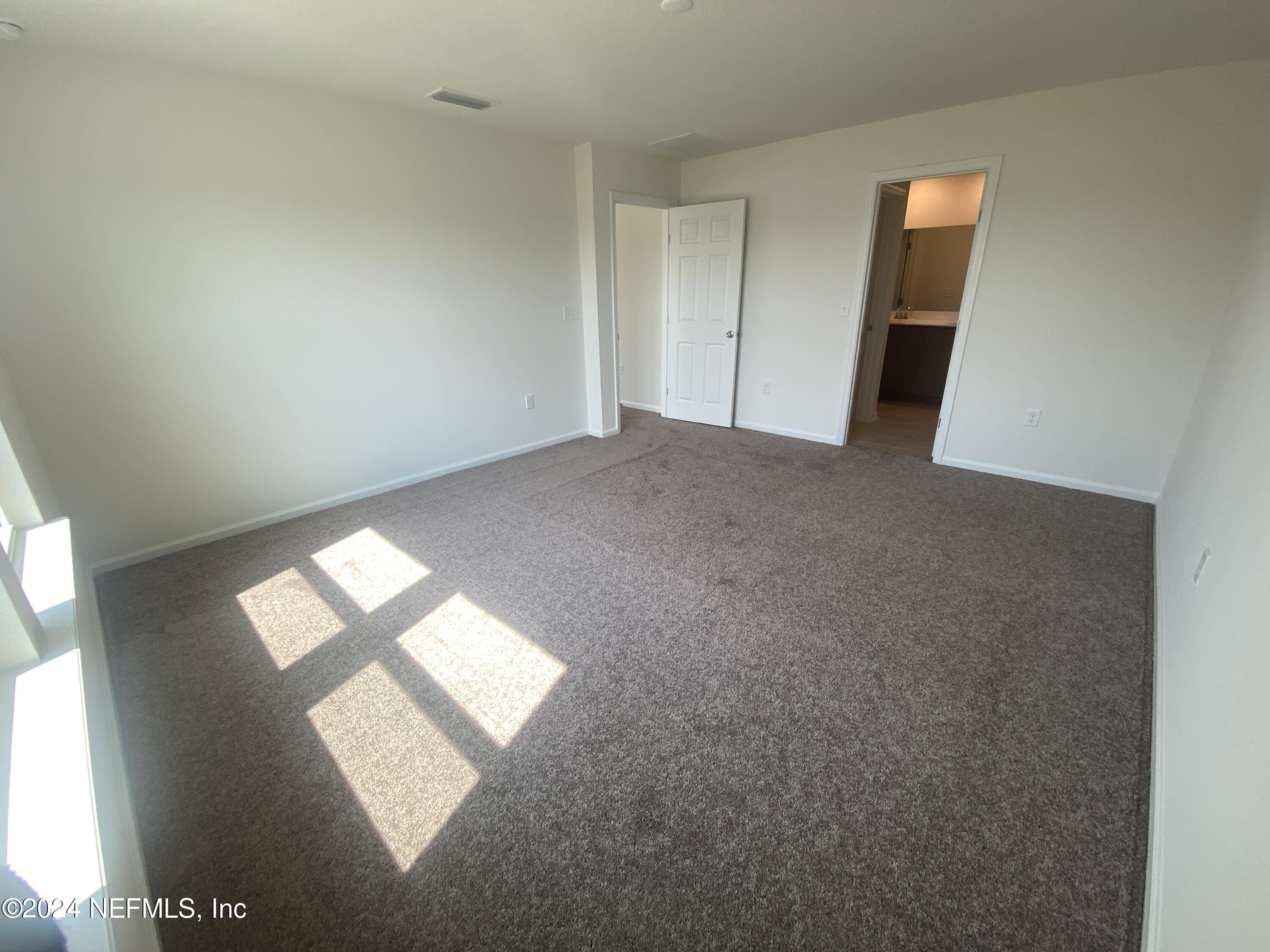 7912 Rippa Vly Way Jacksonville, FL 32222 - Photo 5 of 15 4- Primary Bedroom