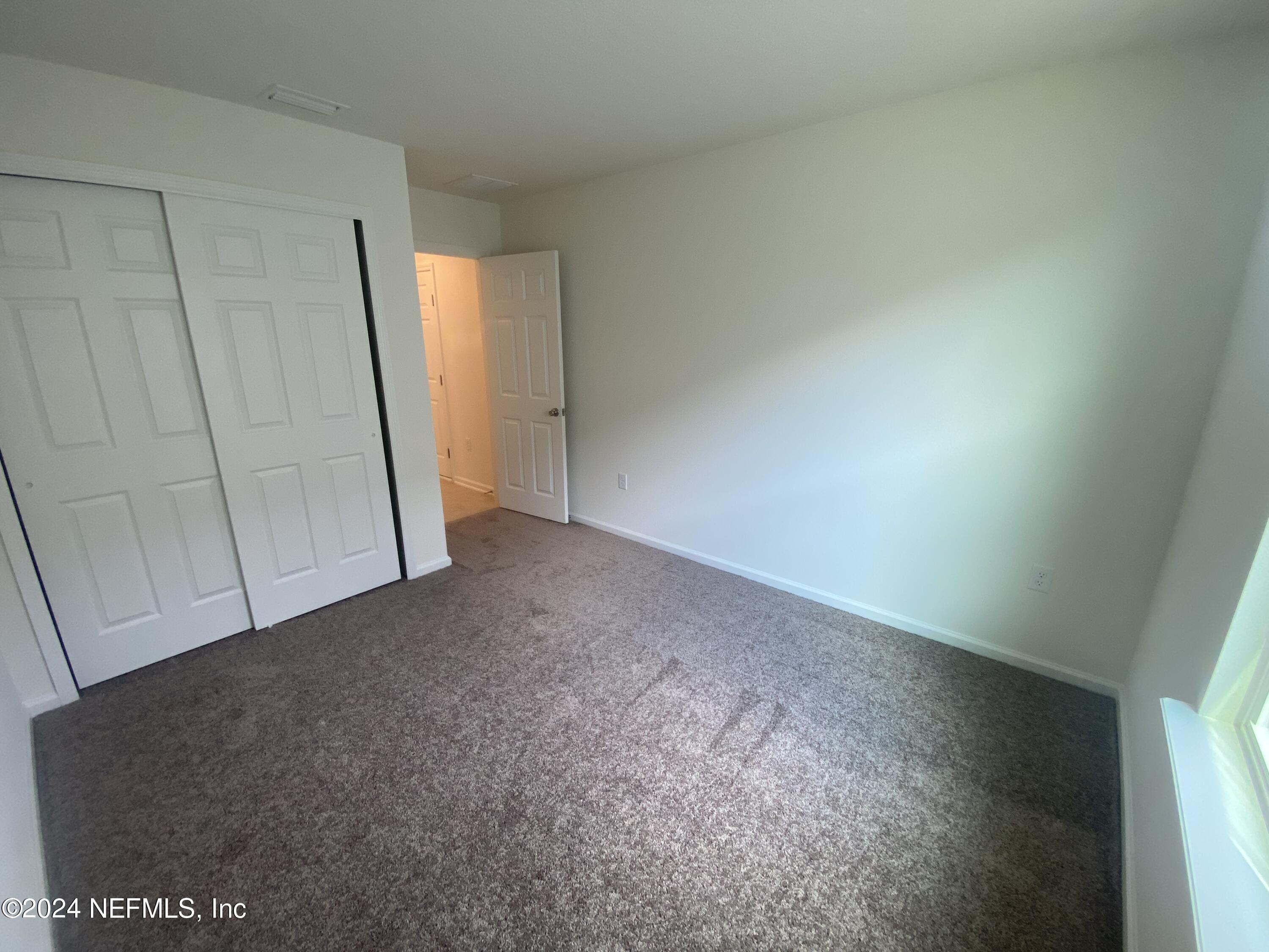 7912 Rippa Vly Way Jacksonville, FL 32222 - Photo 7 of 15 6- Guest Bedroom