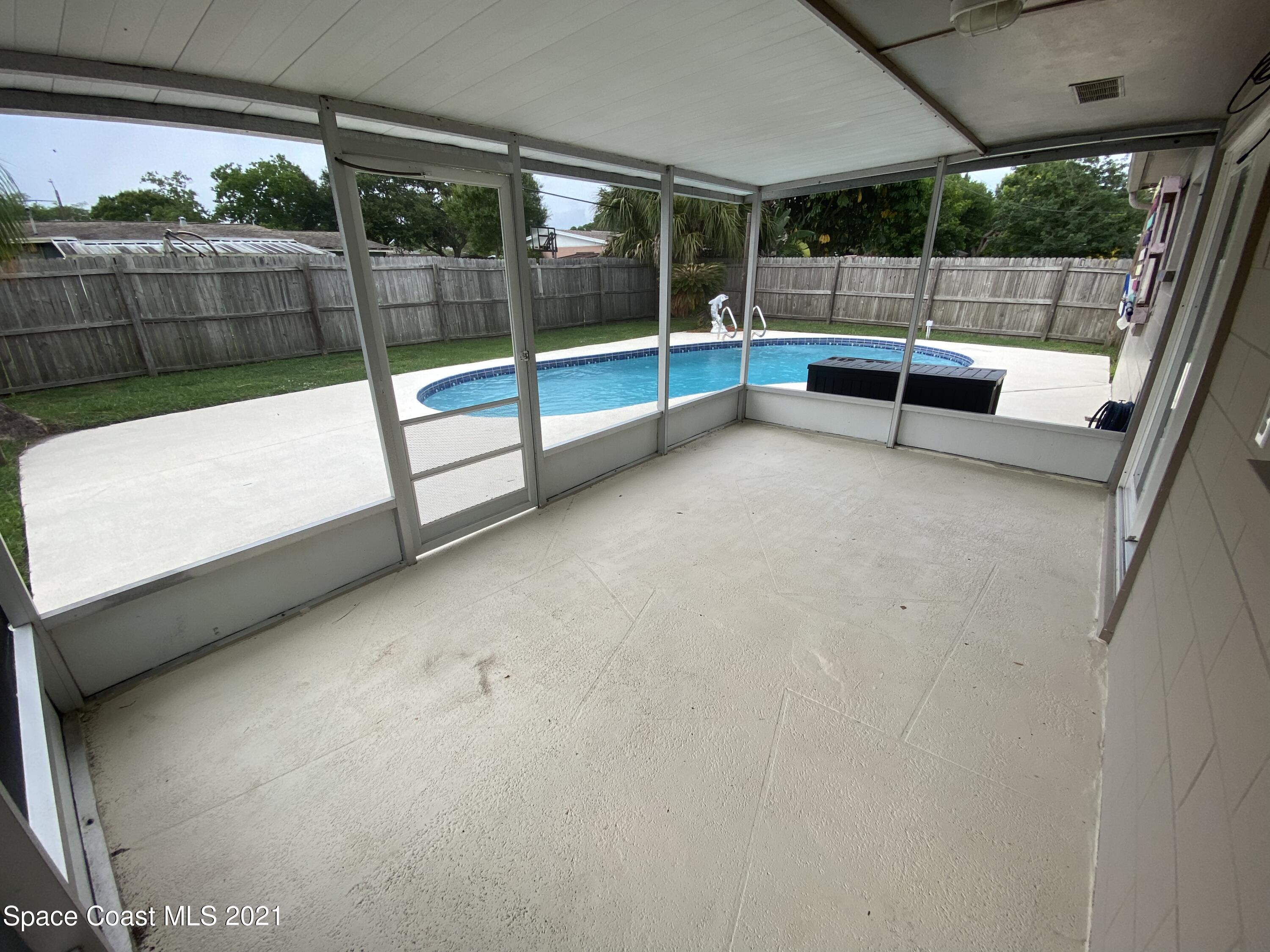 1084 Basque Drive Rockledge, FL 32955 - Photo 15 of 18 Screened Patio