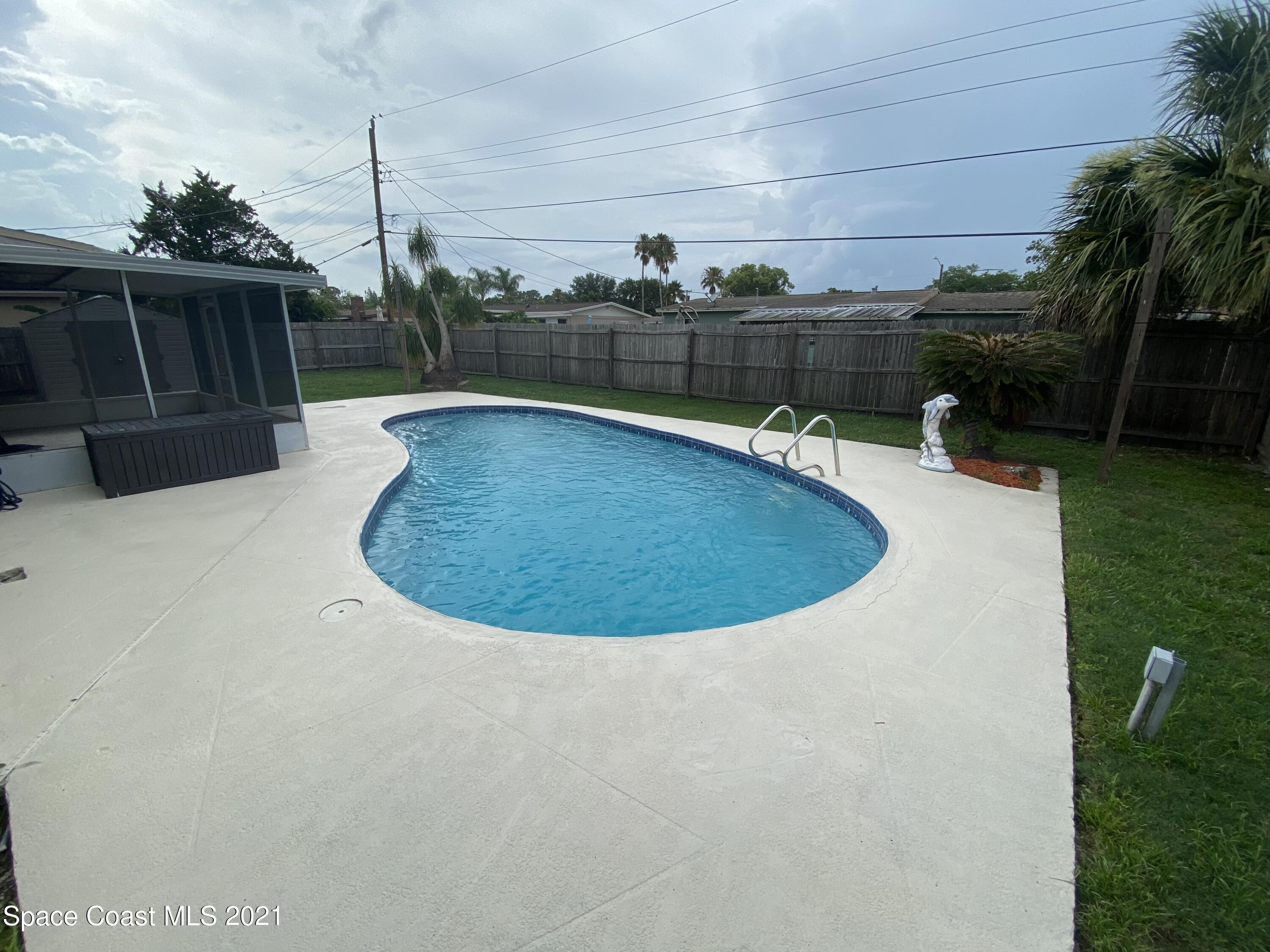 1084 Basque Drive Rockledge, FL 32955 - Photo 17 of 18 Pool/Patio