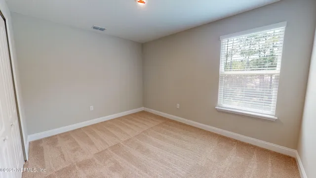 an empty room with a window