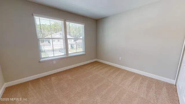 an empty room with a window