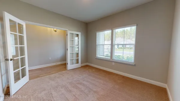 an empty room with windows