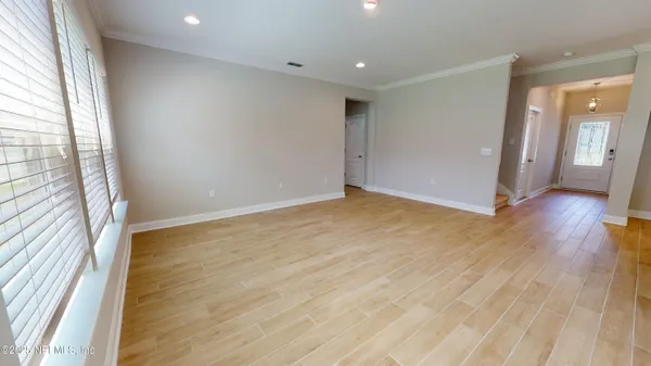 a view of livingroom with hardwood floor and a window