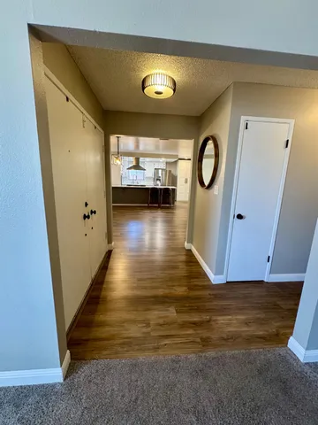 a view of livingroom and hardwood floor