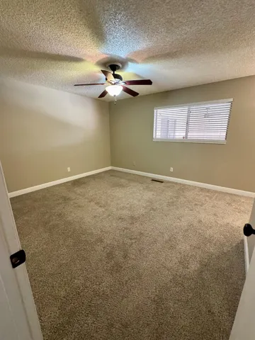 a bathroom with a sink toilet and mirror