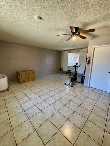 a bathroom with a sink a toilet and a shower