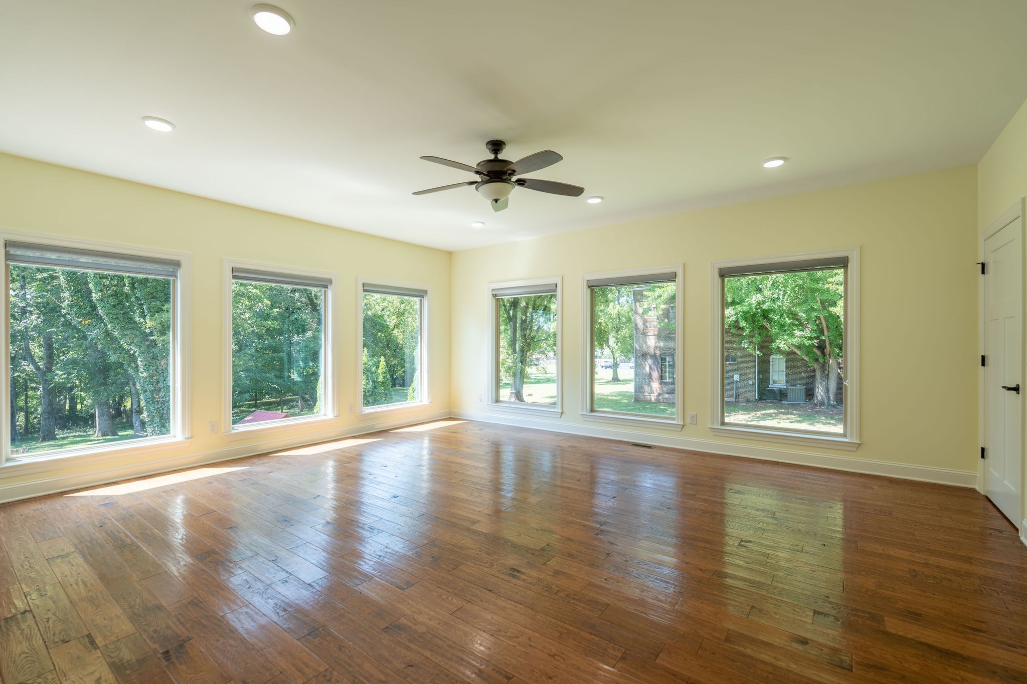 219 Waterloo Street Lawrenceburg, TN 38464 - Photo 25 of 39 a view of an empty room with wooden floor and a window